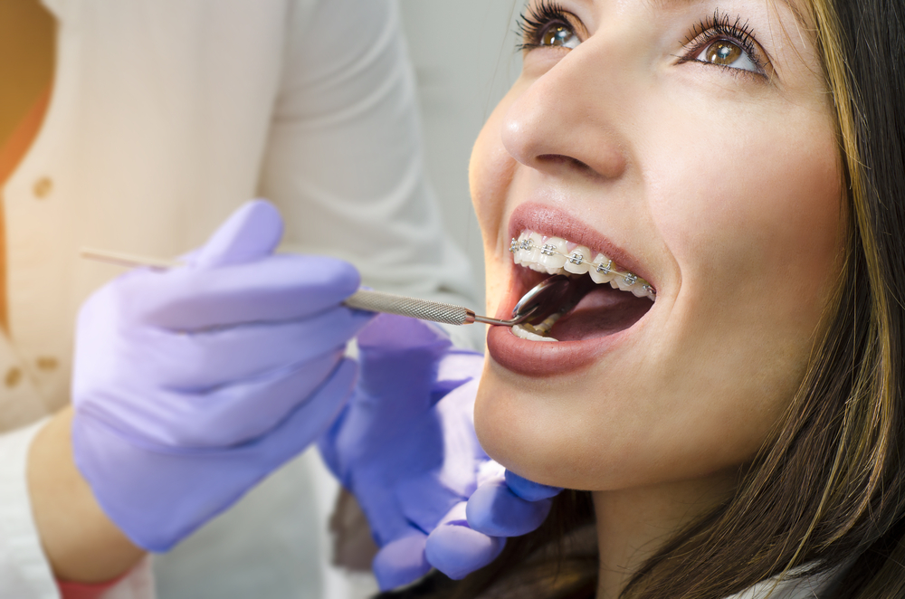 Patient Reviewing Smile Results After Prosthodontic Treatment – Prosthodontic Dentistry